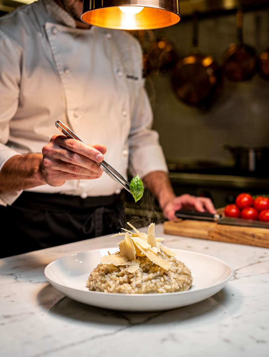 Chef plating a dish